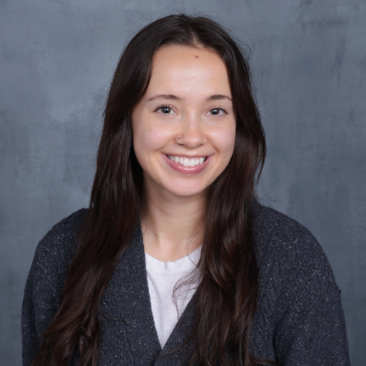 Portrait Image Of Sophia In A Dark Gray Background